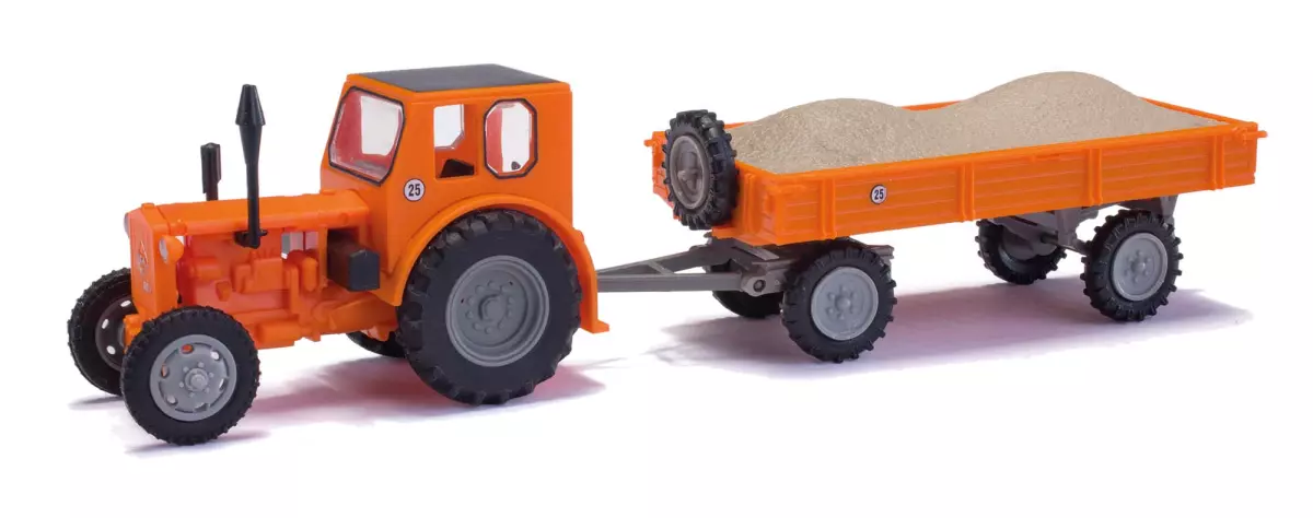 Trattore e rimorchio Pioneer con ghiaia Busch 210006436 - HO 1/87 -